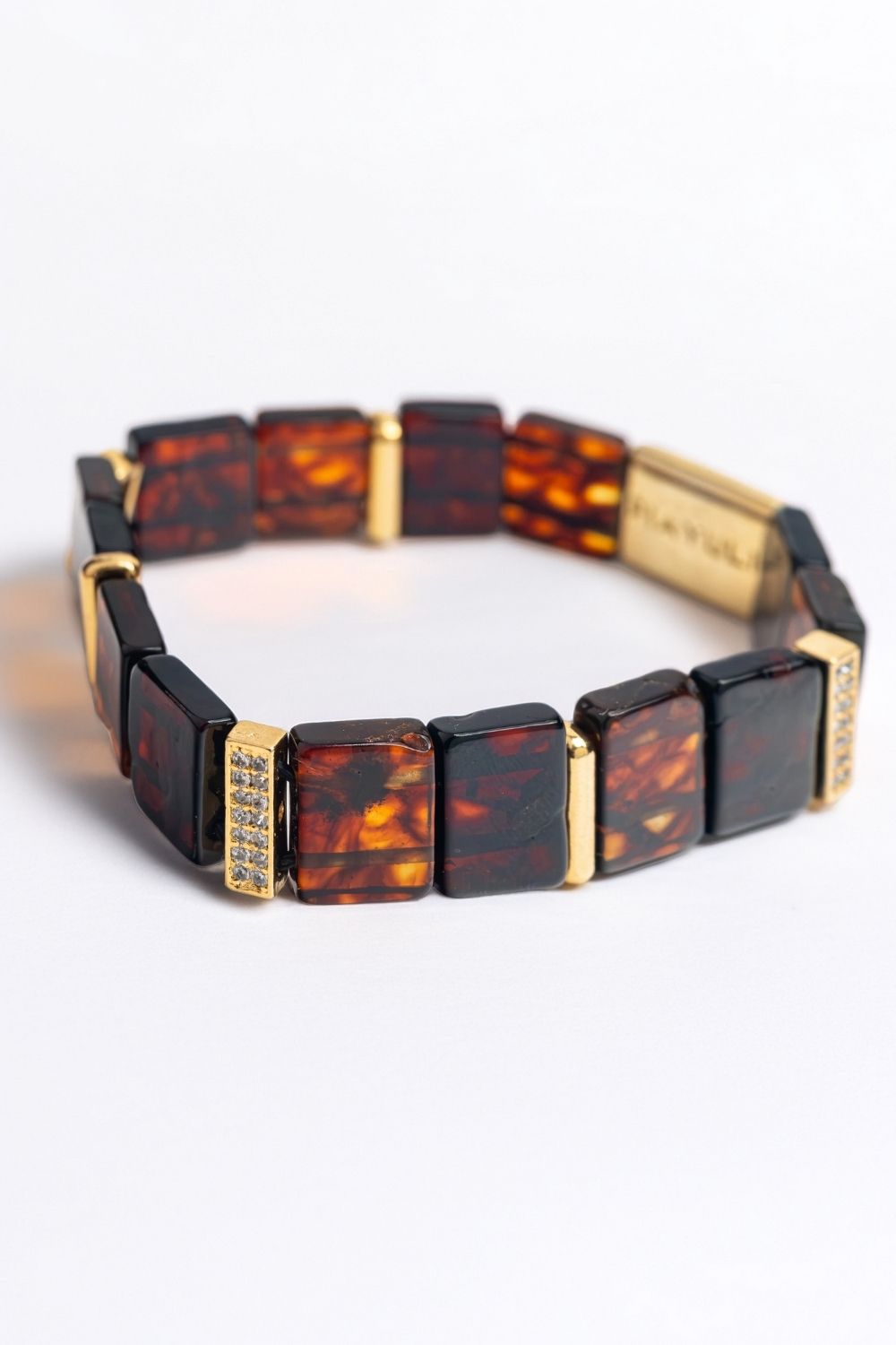 Natural amber gemstone detail on the Piayuli strength bracelet