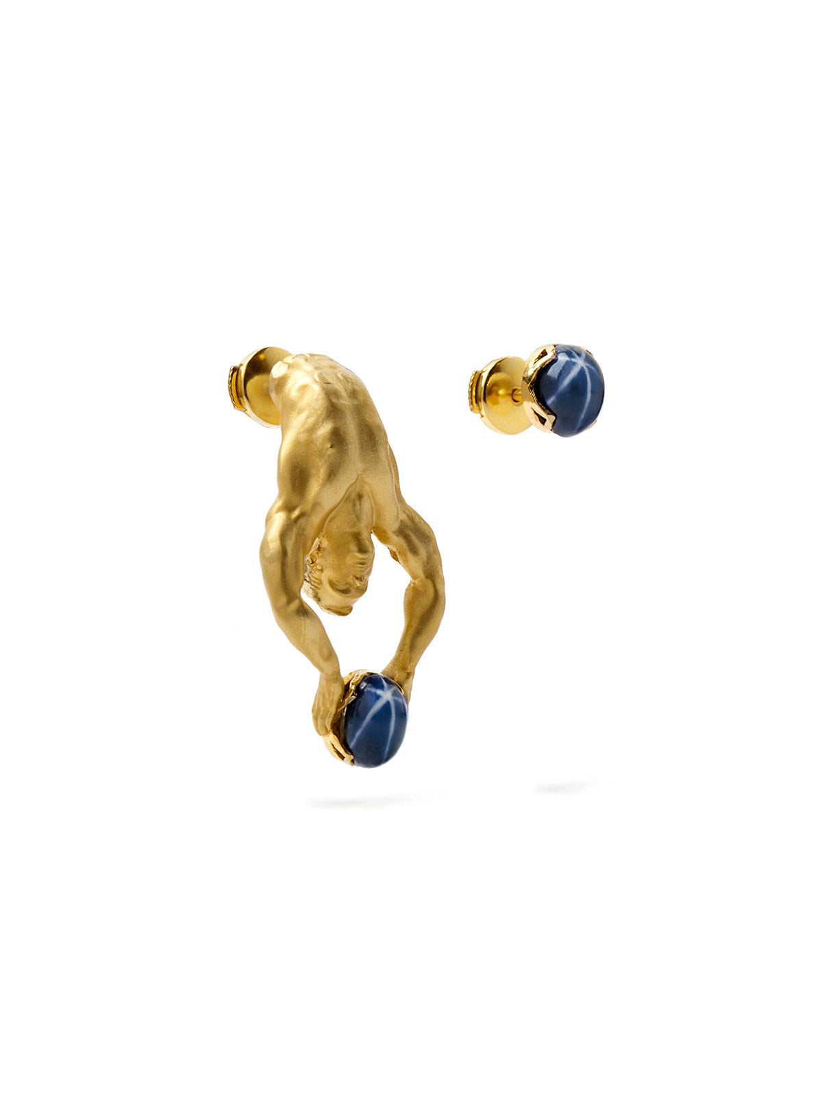 Close-up of Atlas Earrings with natural star sapphire gemstone