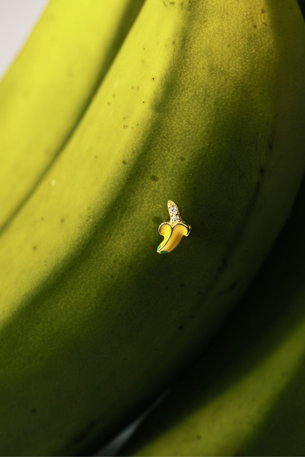 Hand-applied enamel detail on Banana Baby Earrings