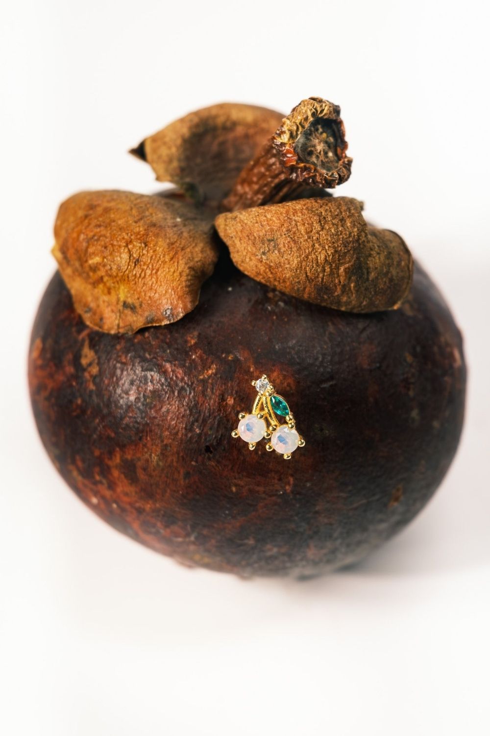 Side view of Cherry baby earrings by Piayuli