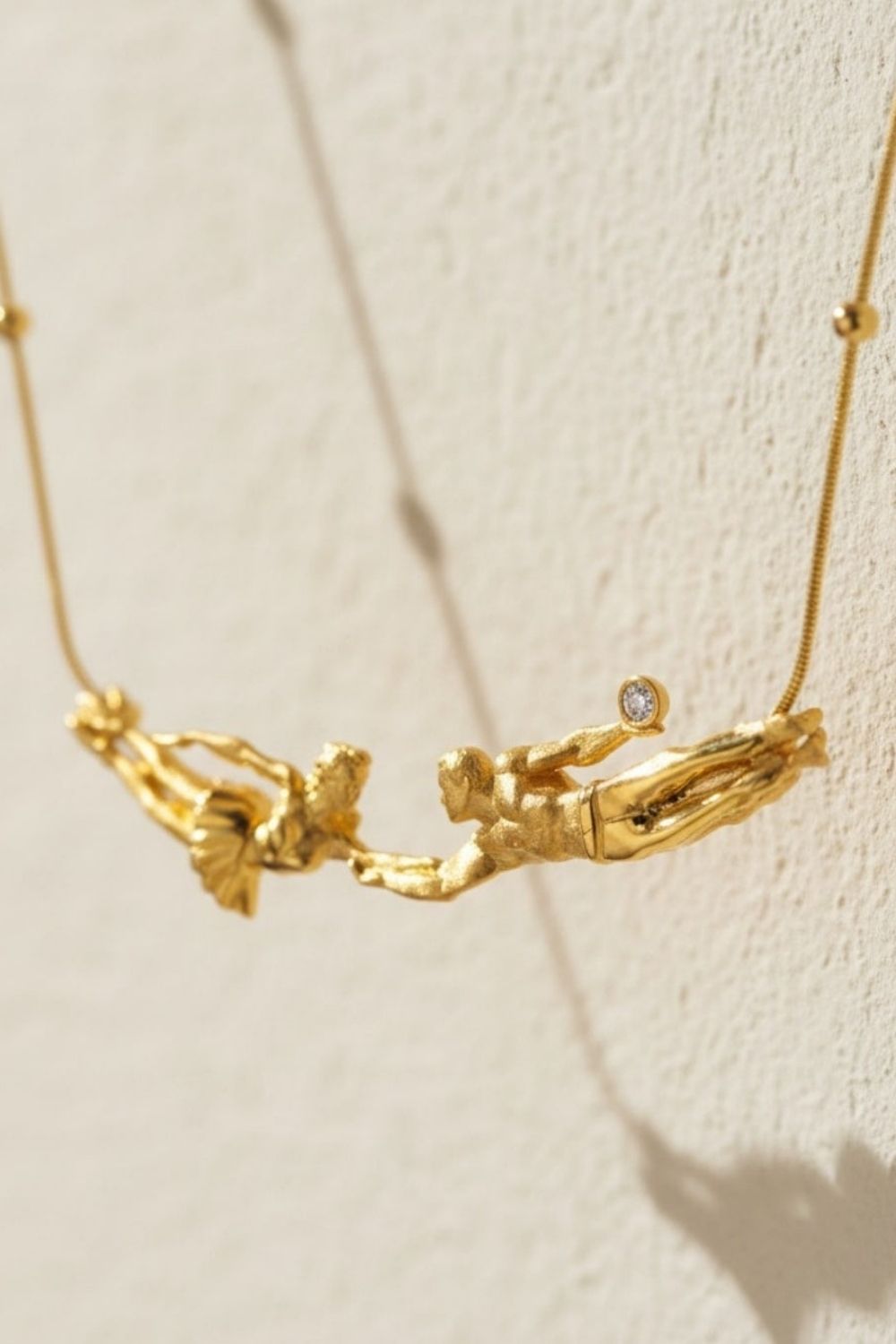 22K gold plated Falling Into You Necklace detail view