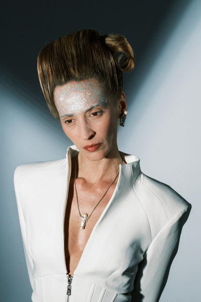 Woman wearing the Lord of the Neal Necklace by Piayuli