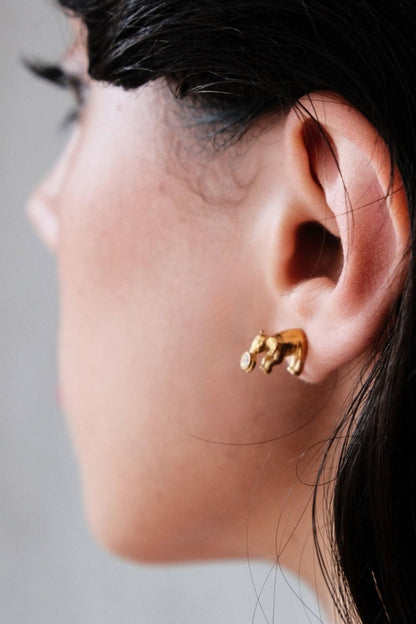 Woman wearing Mini Elephantes Earrings by Piayuli