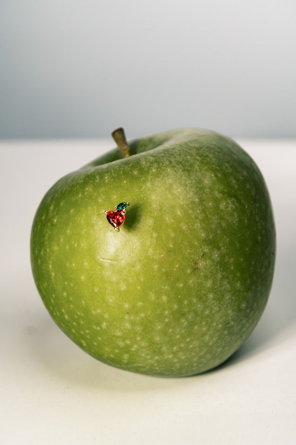 Detailed view of Red Apple Baby Earrings handcrafted by Piayuli