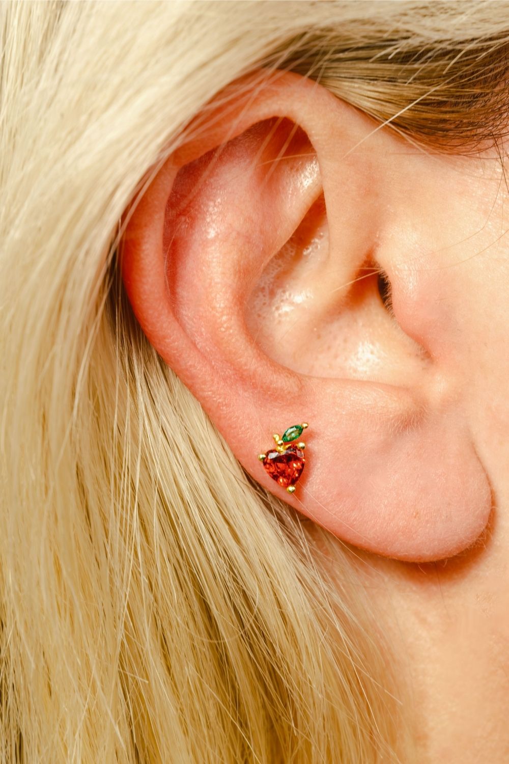 Side view of Red Apple Baby Earrings by Piayuli