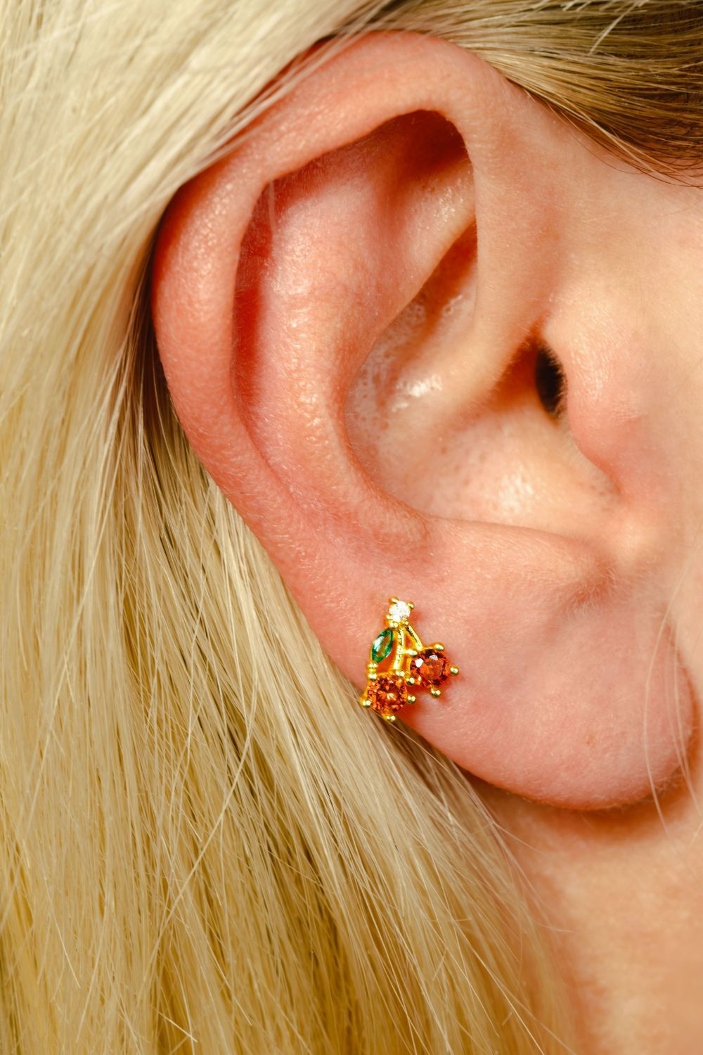 Side view of Red Cherry Baby Earrings by Piayuli