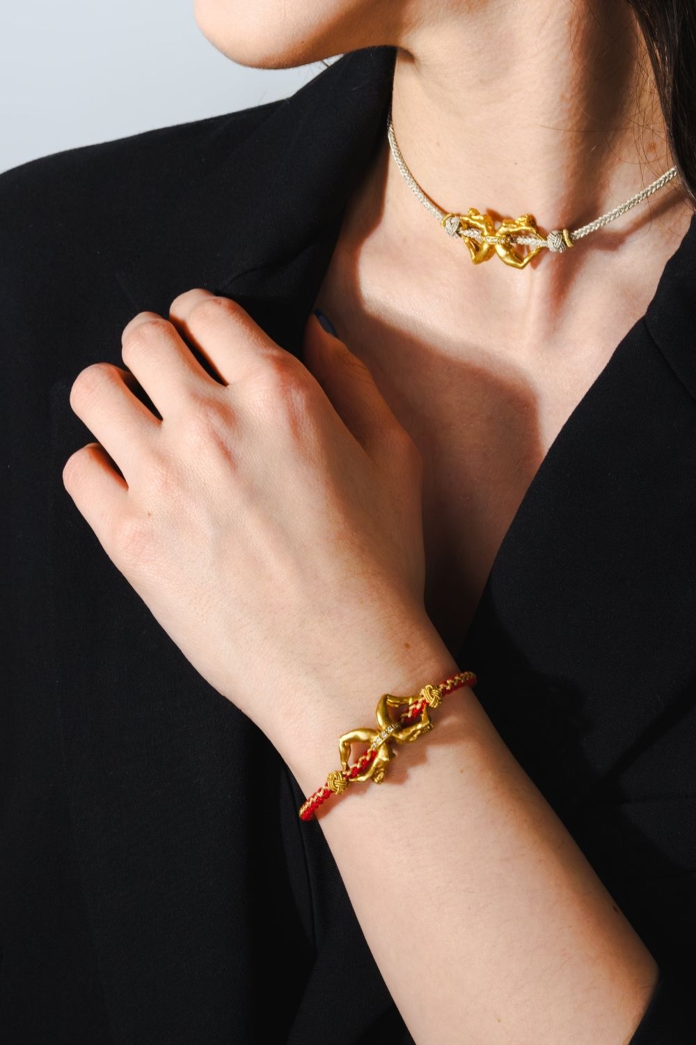Unity Red Bracelet with red rope band and gold plated details