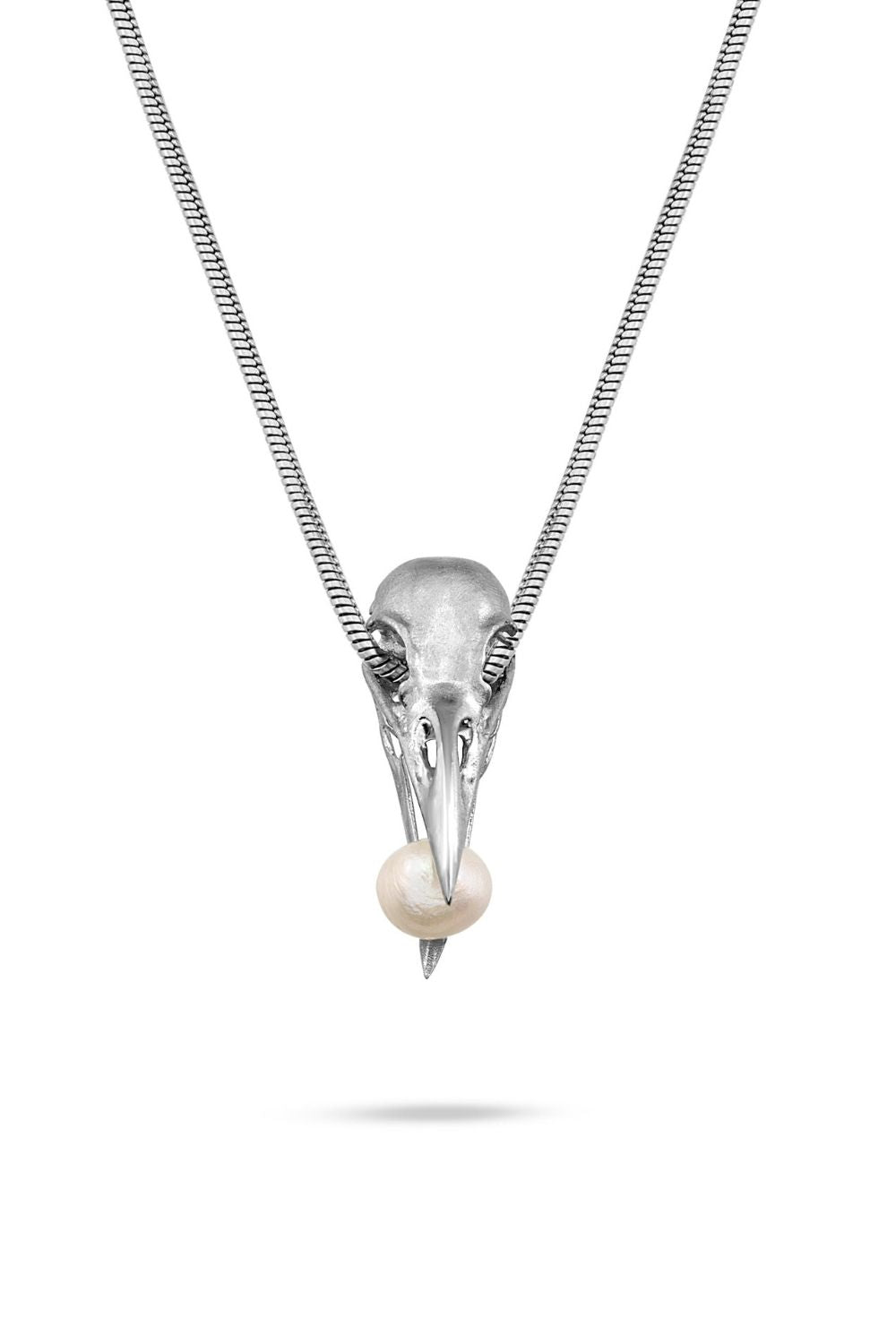 Artistic symbolic detail on the Wisdom Pearl Necklace